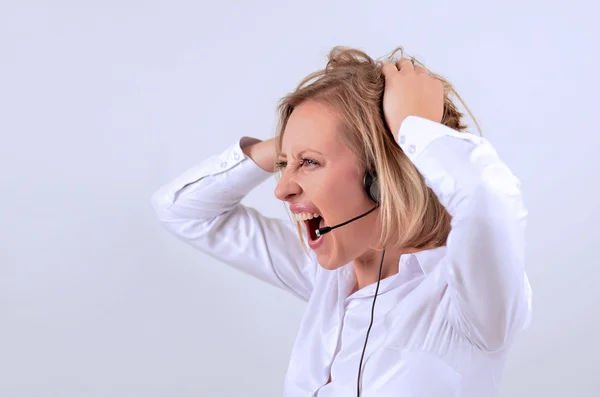 Exitosa mujer de negocios con auriculares hablando por teléfono —  Fotos de Stock