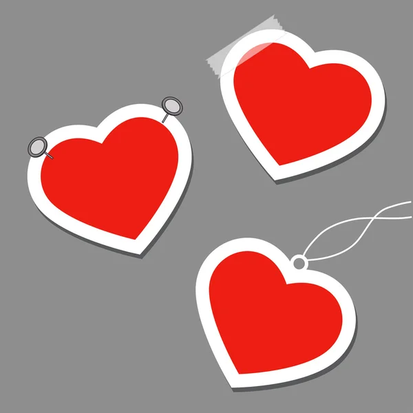 Set of heart tags with pins, tape and thread — Stock Vector