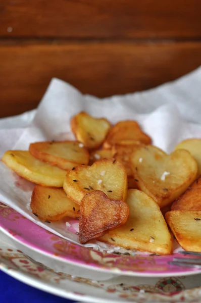 Pommes frites, Ofenkartoffeln Stockfoto