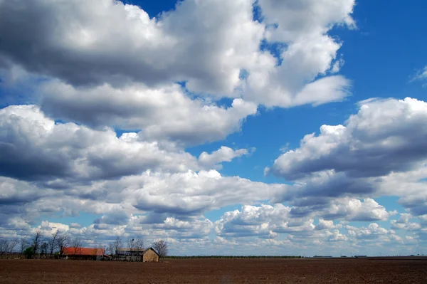 stock image Farm with cloudy sky