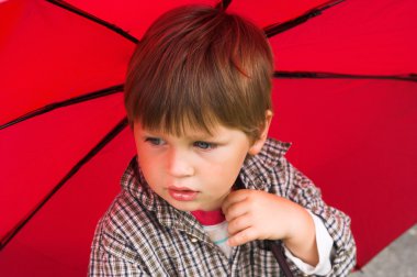 Boy with the umbrella clipart