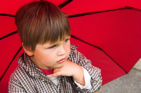stock image Little boy with the umbrella