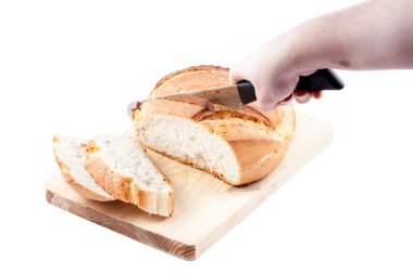 A woman is making bread slices of an isolated Hogaza (Spanish br clipart