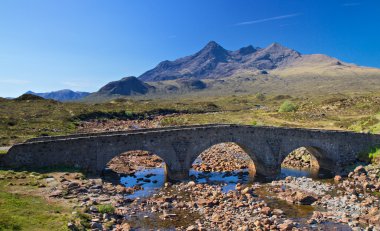 Stone bridge over a small river, Isle of Skye clipart