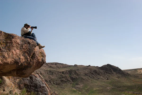 stock image Photographer on stone