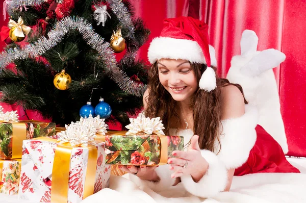 Girl gets a Christmas present Stock Picture