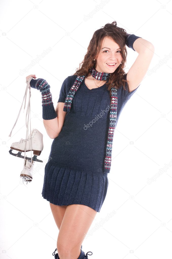 Girl holding ice skates
