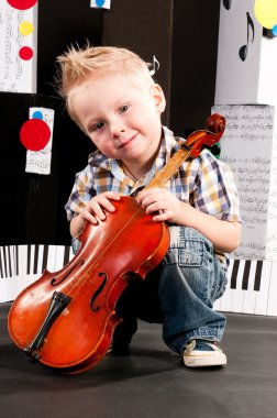 Boy with a violin clipart