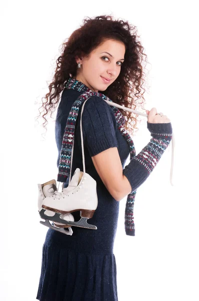 Girl holding ice skates — Stock Photo, Image