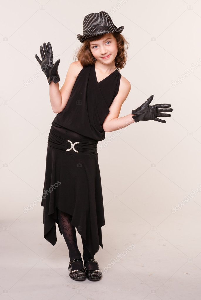 A girl dressed as a gangster
