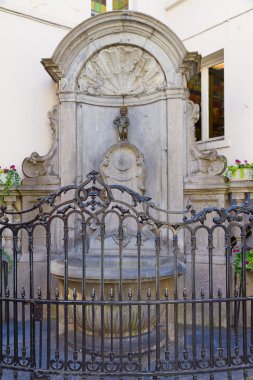 Manneken Pis statue in Brussels clipart