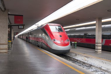 Frecciargento waiting train station in Florence clipart
