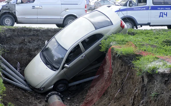 stock image Car fell into the trench