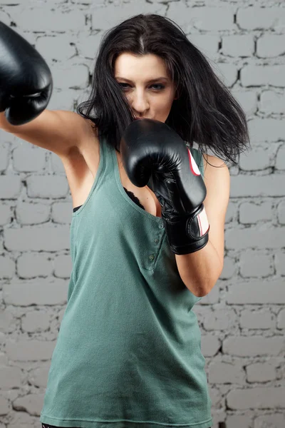 Portrait of sexy boxer girl with gloves on hands — Stock Photo, Image