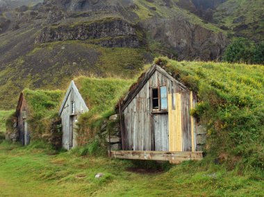 Icelandic turf houses clipart