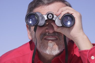 Man searching with Binoculars clipart