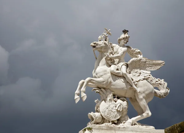 Paris - statue from entry of Tuileries garden and strom clouds — Stock Photo, Image