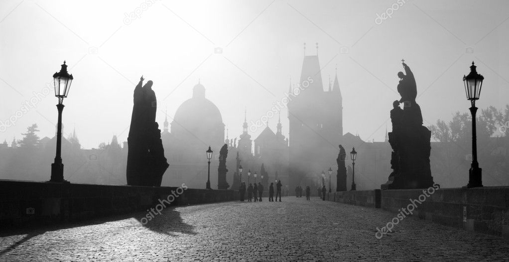 Prague - Charles bridge in morning fog and light