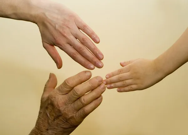 Hands of woman s generations — Stock Photo, Image