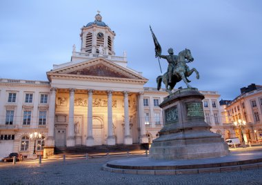 Brussels - St Jacques Church at The Coudenberg and Godefroid Van Bouillon king of Jesusalem memorial in evening. clipart