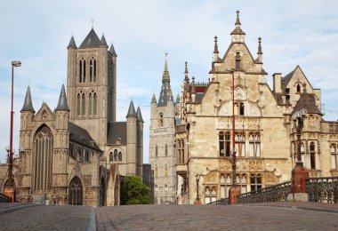 Gent - Look from Saint Michael s bridge to Nicholas church and town hall in evening on June 24, 2012 in Gent, Belgium. clipart