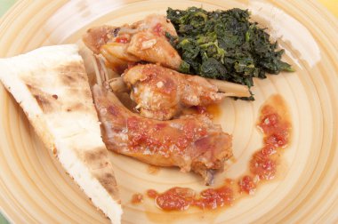 Rabbit cacciatore with spinach clipart