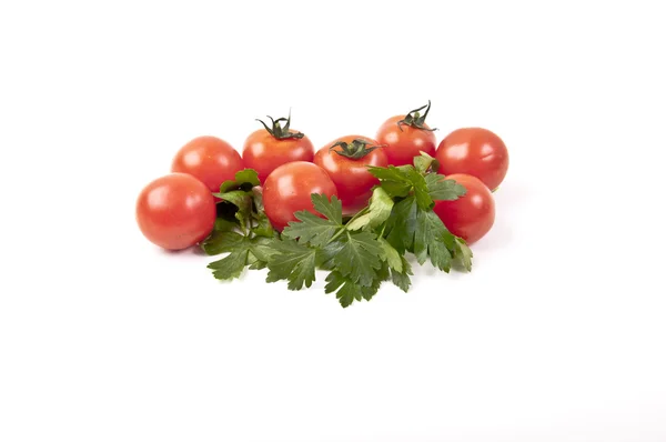 Pomodorini rossi con prezzemolo — Stock Photo, Image