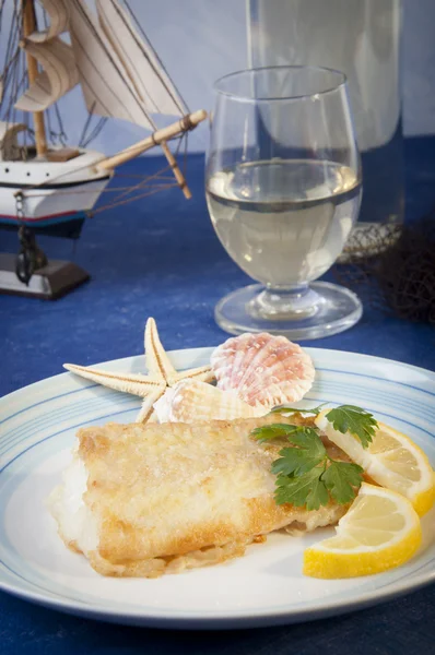 Bacalao aromatizado cocido en una sartén —  Fotos de Stock