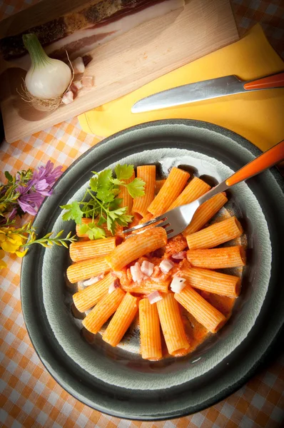 stock image Rigatoni with grappa pacetta pork