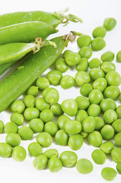 stock image Fresh pea fruit with green leaf