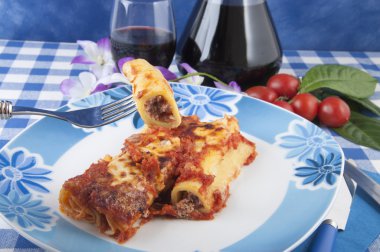 Cannelloni with meat sauce clipart