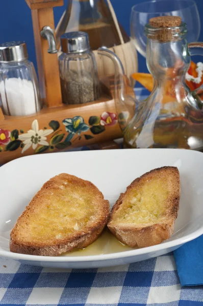 Bruschetta garlic and extra virgin olive oil — Stock Photo, Image