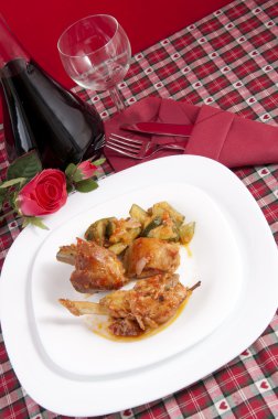 Chicken cacciatore with boiled zucchini and tomato clipart