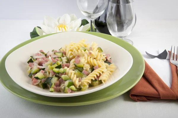 stock image Fusilli with zucchini and ham