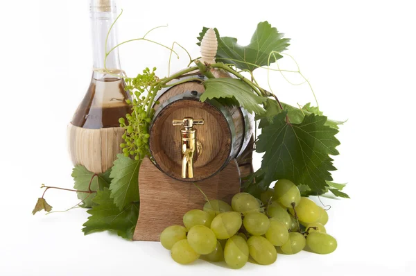 stock image In oak casks with vines and grapes white and black