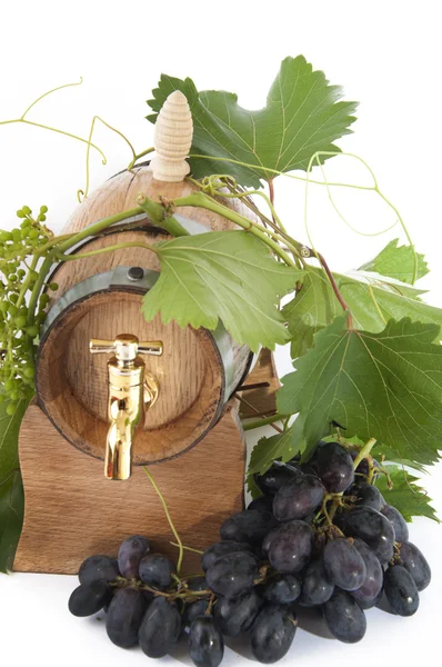 stock image In oak casks with vines and grapes white and black