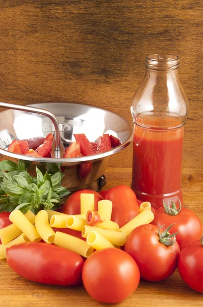 Stock image Roman and San Marzano tomatoes to make the past