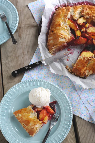 Peach and Plum Galette with ice cream — Stock Photo, Image