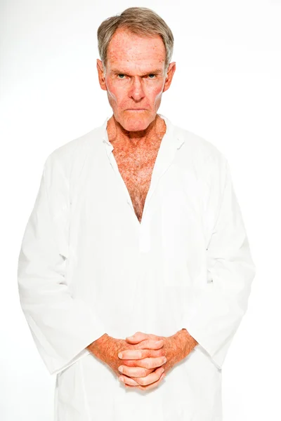Expressive good looking senior man casual summer dressed against white wall. Spiritual and characteristic. Isolated. Studio shot. — Stock Photo, Image