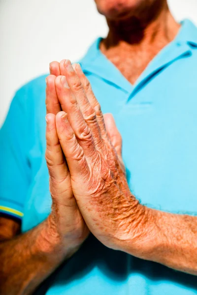 Spiritual hands of senior man. Closeup. Studio shot. — Stock Photo, Image