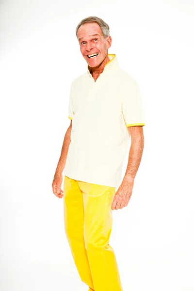 Expressive good looking senior man casual summer dressed against white wall. Happy, funny and characteristic. Isolated. Studio shot. — Stock Photo, Image