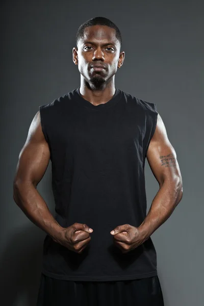 Black american basketball player. Studio portrait isolated on grey background. — Stock Photo, Image