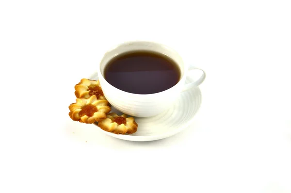 Cup of tea and cookie on white background — Φωτογραφία Αρχείου