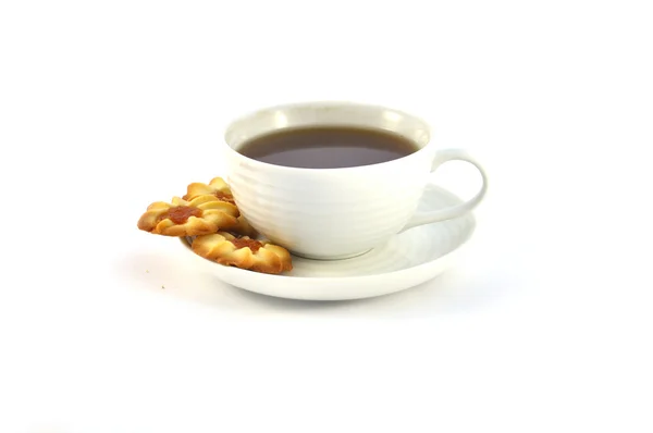 Cup of tea and cookie on white background — Φωτογραφία Αρχείου