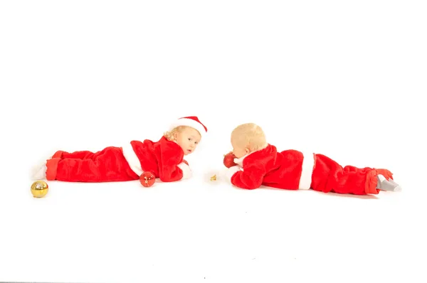 两个屁股孩子孤立在白色的圣诞老人 clauss 服装 — 图库照片