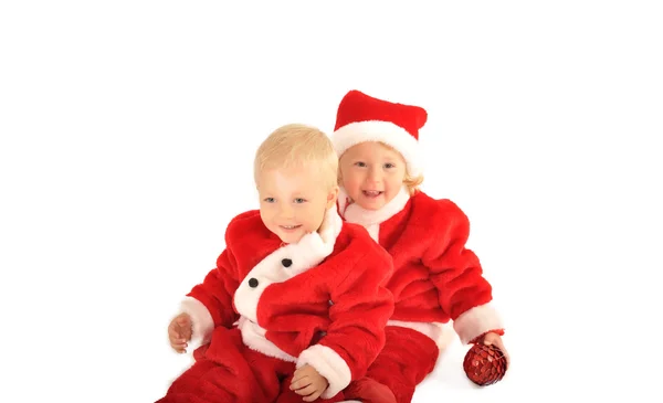 Dois fanny crianças no santa clauss trajes isolado no branco — Fotografia de Stock