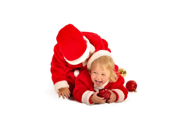 Zwei fanny kids in weihnachtsmann clauss kostümen isoliert auf weiß — Stockfoto