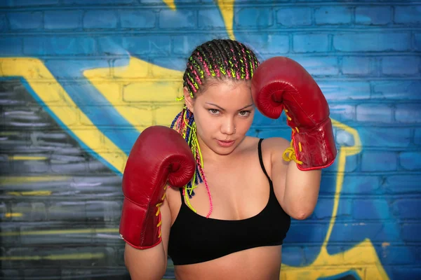 Girl with red boxing gloves — Stock Photo, Image