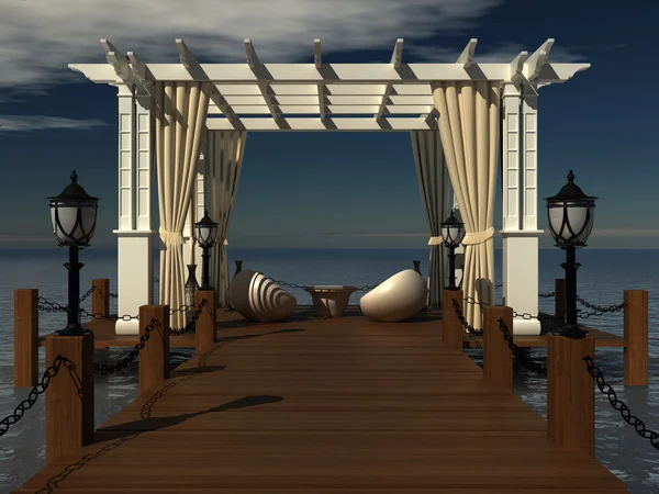 Romantischer Hochzeitspavillon mit Holzpergola an der Seebrücke am Meer. Paradiesischer Ort zum Entspannen mit Lounge-Bereich lizenzfreie Stockfotos