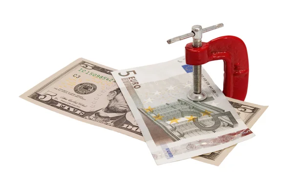 Dollar och euro fastklämd i skruvstäd. — Stockfoto